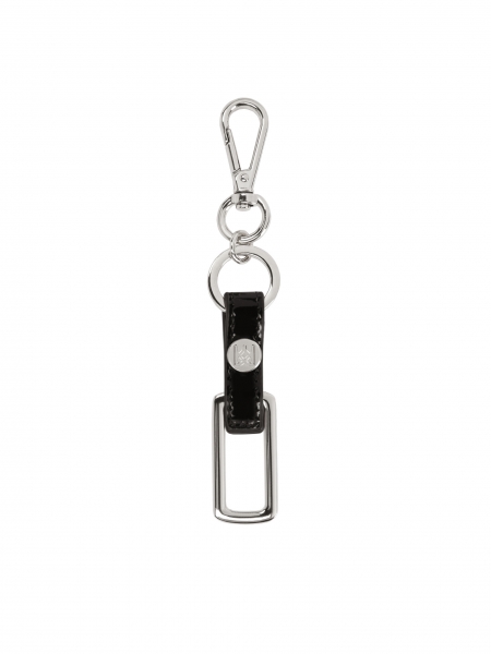Minimalistischer Schlüsselanhänger mit Lacklederband. 