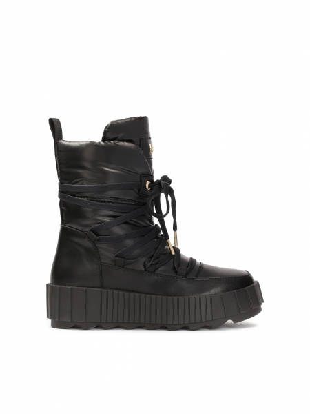 Black women's snow boots on a thick sole  DAGE