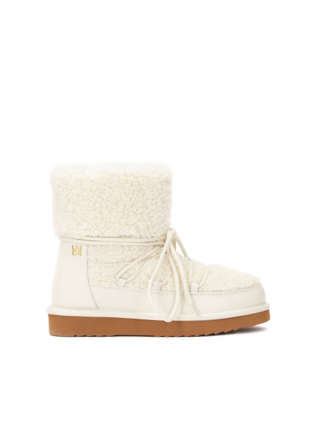 Cream snow boots on a brown sole ZULA