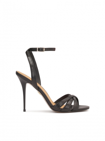 Black leather sandals fastened around the ankle EVA