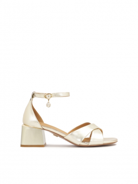 Classic sandals on a low post in gold color  JOSEFIN