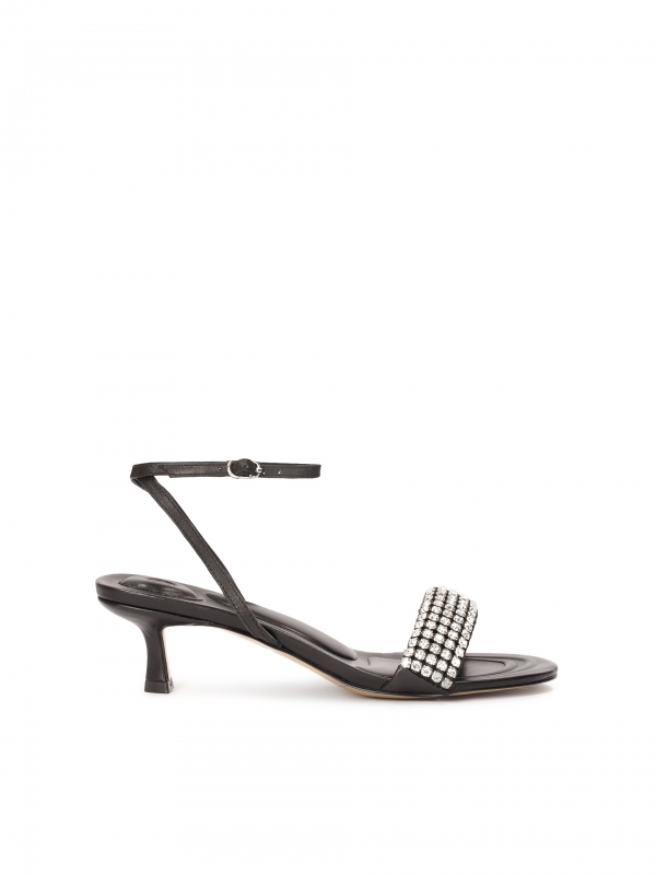 Black low stiletto sandals fastened around the heel decorated with a jewellery insert TORI